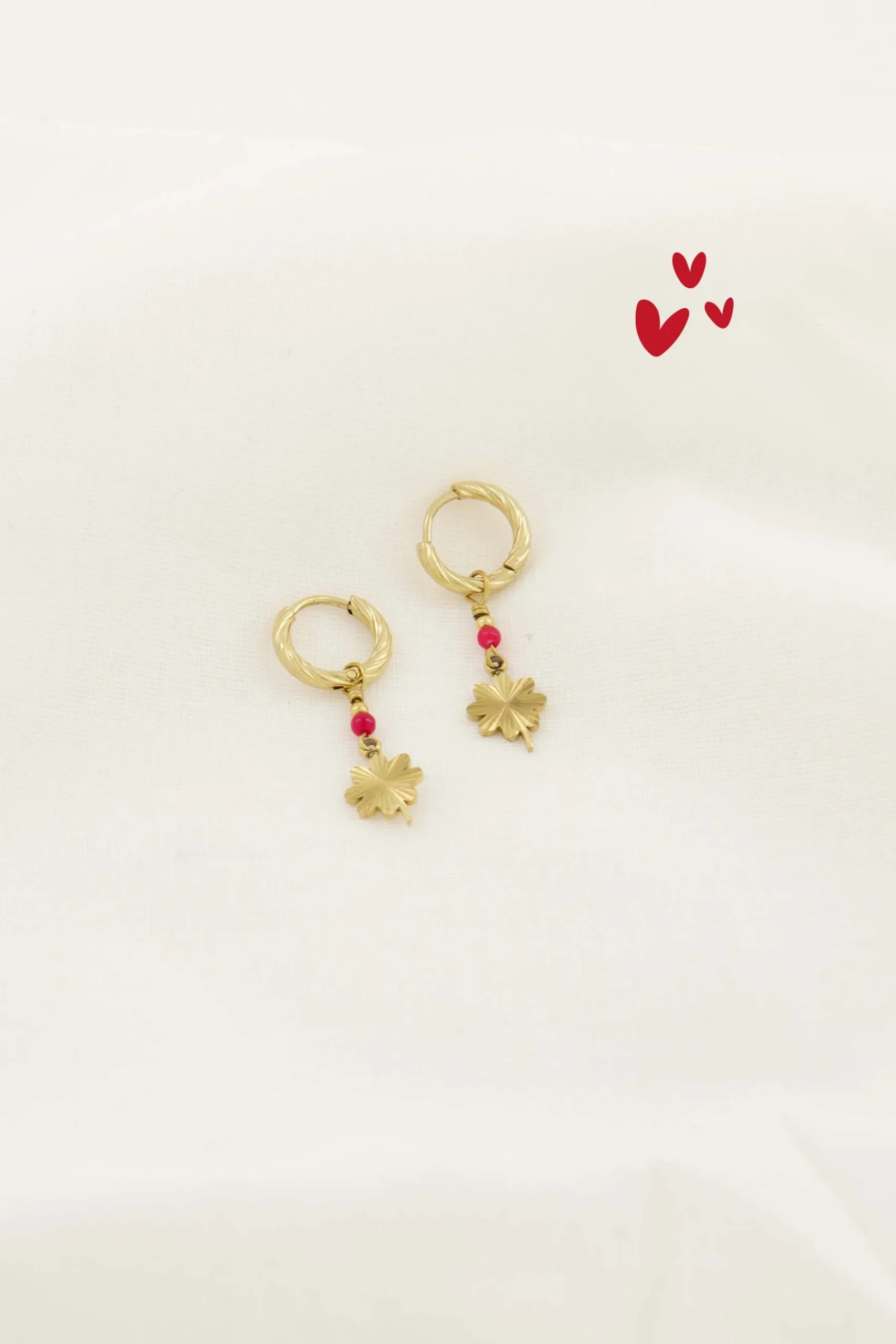 zusss_oorbel_met_klavertje_roze_rood_0.webp Sale oorbel met klavertje roze rood Oorbellen