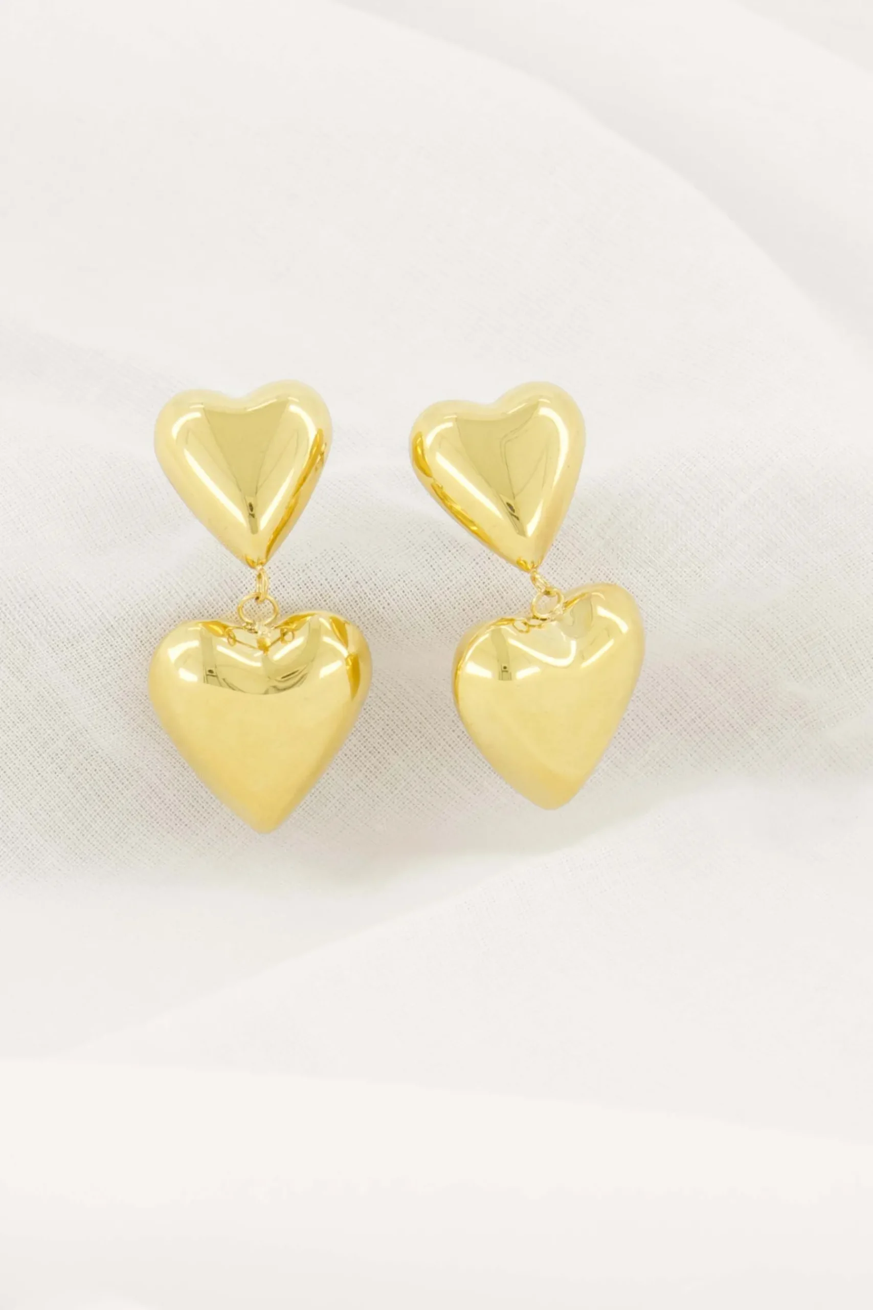 zusss_oorbel_met_twee_hartjes_goud_0.webp New oorbel met twee hartjes Oorbellen