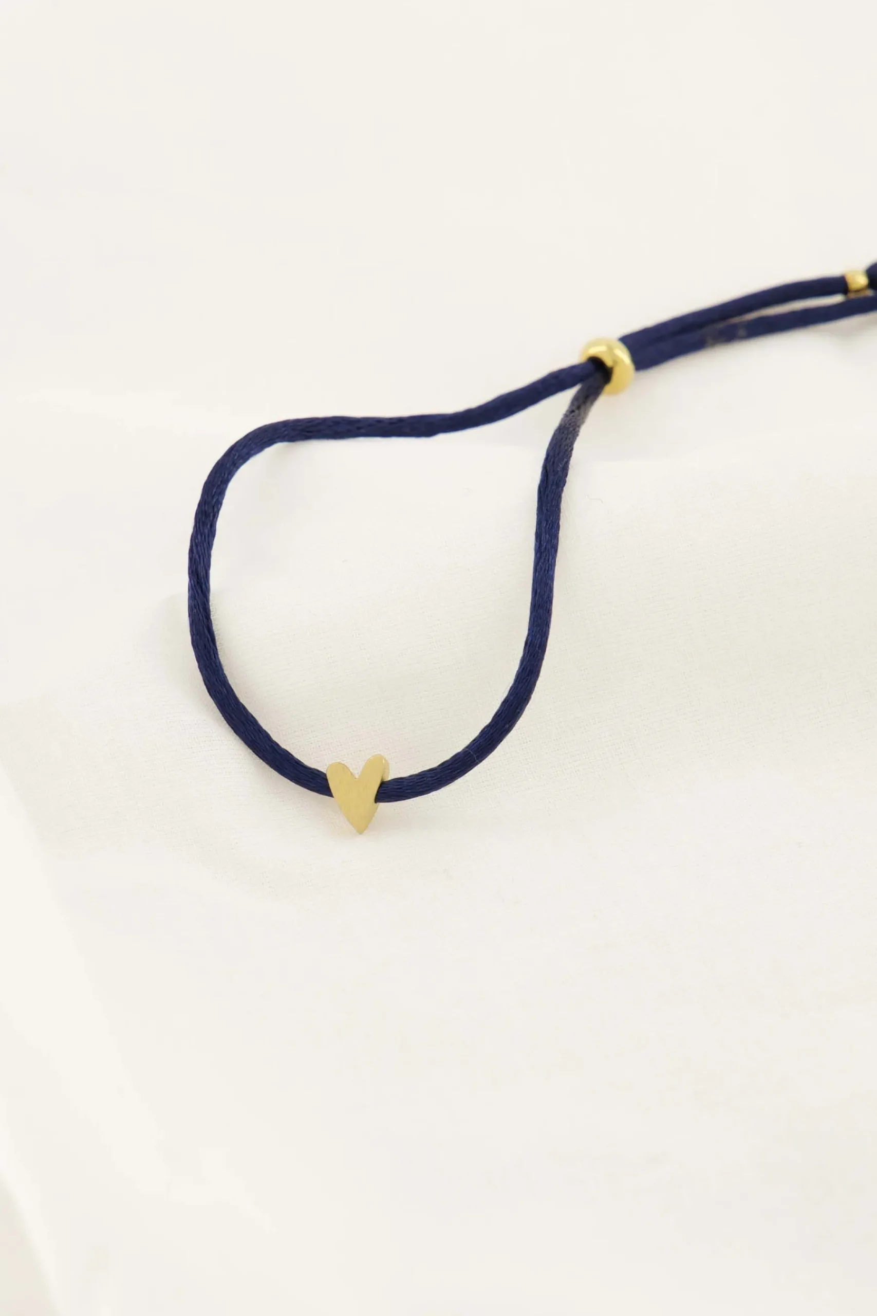 zusss_touwarmbandje_hartje_donkerblauw_0.webp Store touwarmbandje hartje Armbandjes