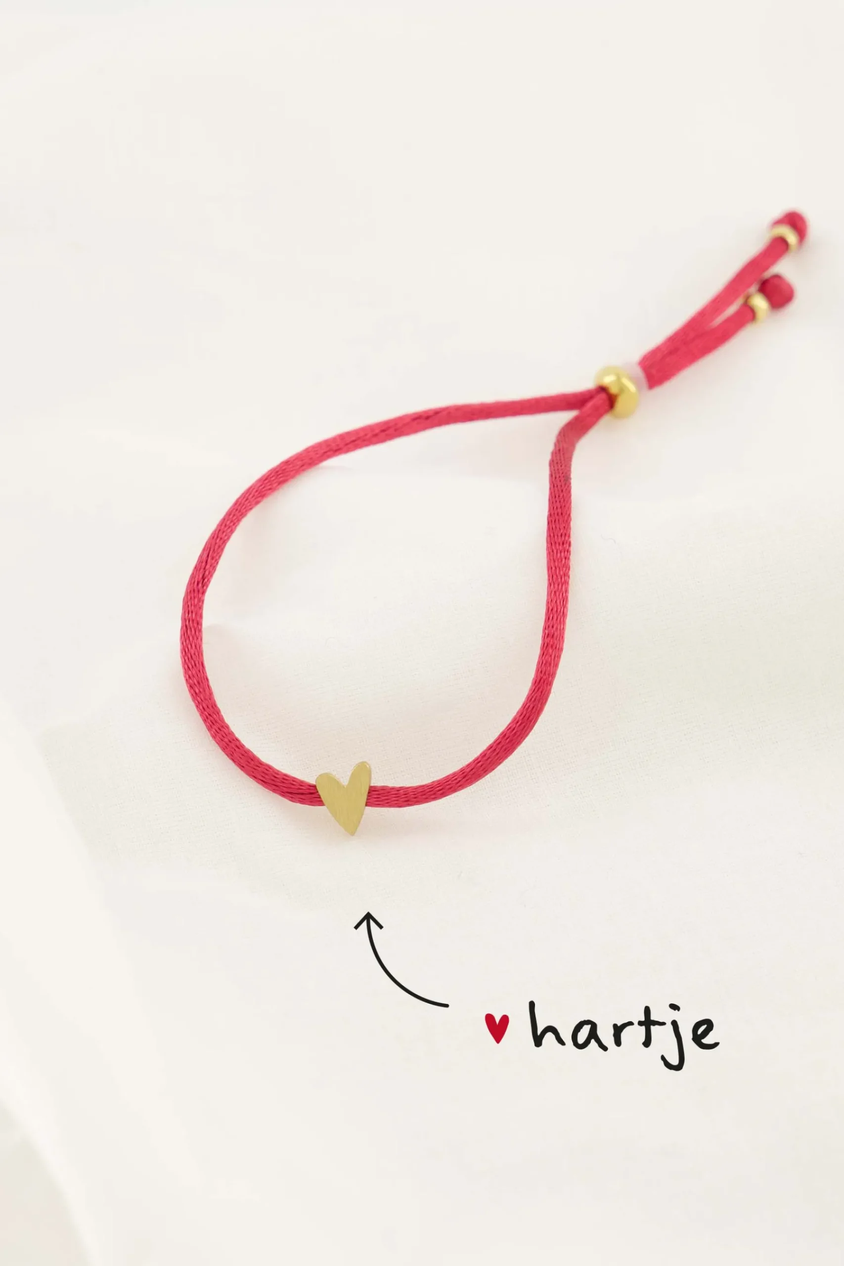 zusss_touwarmbandje_hartje_roze_rood_0.webp Discount touwarmbandje hartje roze rood Armbandjes